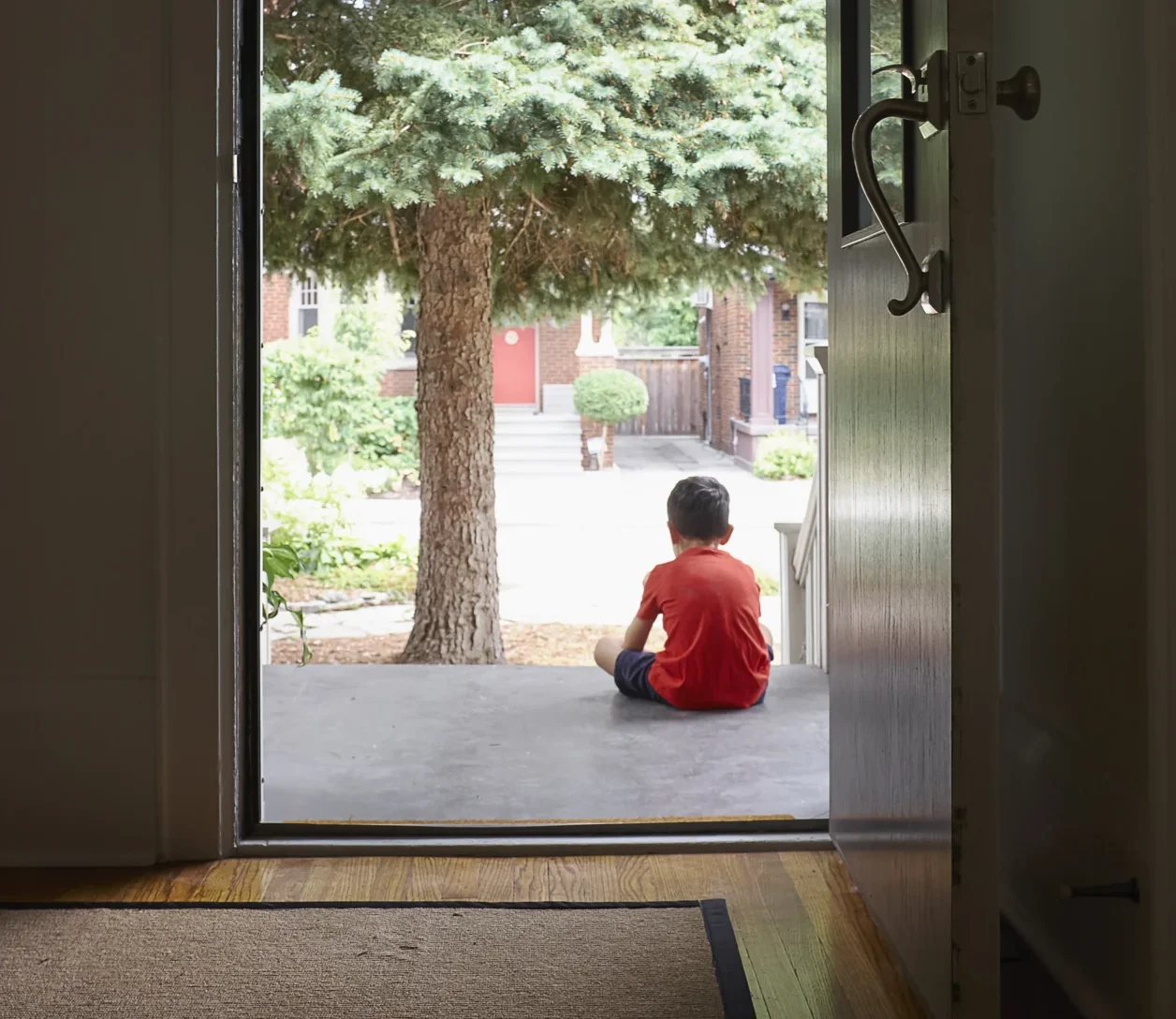 Young Boy Sitting On Front Step Of House Rear Vie 2024 06 13 19 40 27 Utc